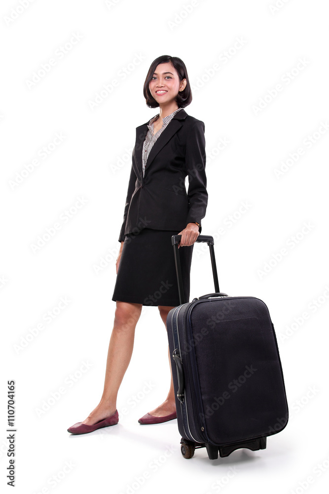Businesswoman standing with her suitcase, full body Businesswoman standing with her suitcase, full body