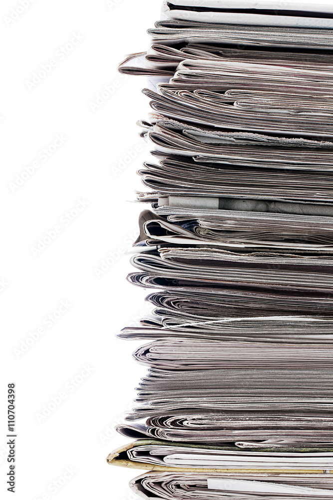 cropped image of a stack of newspaper. cropped image of a stack of newspaper.