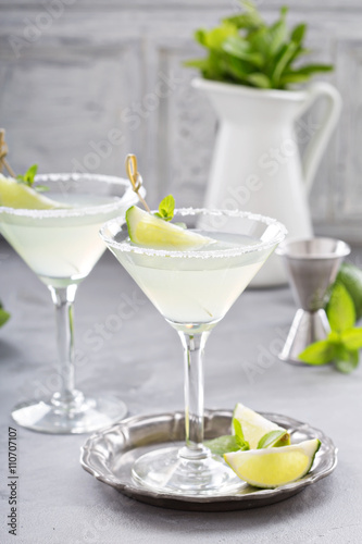 Lemonade martini cocktail garnished with lime