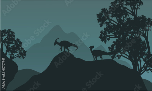 Fotografie, Obraz Silhouette of parasaurolophus in hills
