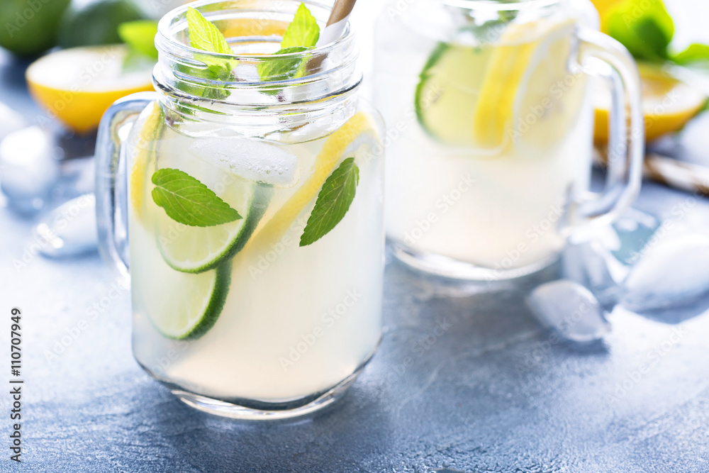 Fresh citrus lemonade in mason jars Fresh citrus lemonade in mason jars