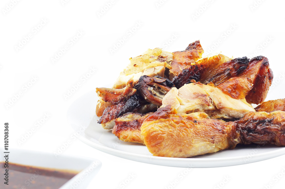 Grilled chicken on white dish Grilled chicken on white dish