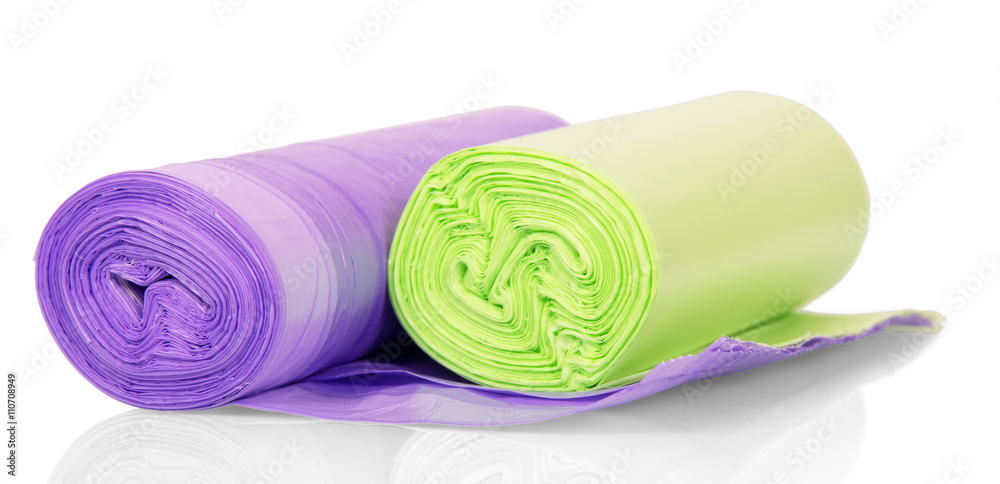 Colored garbage bags in rolls isolated on white. Colored garbage bags in rolls isolated on white.