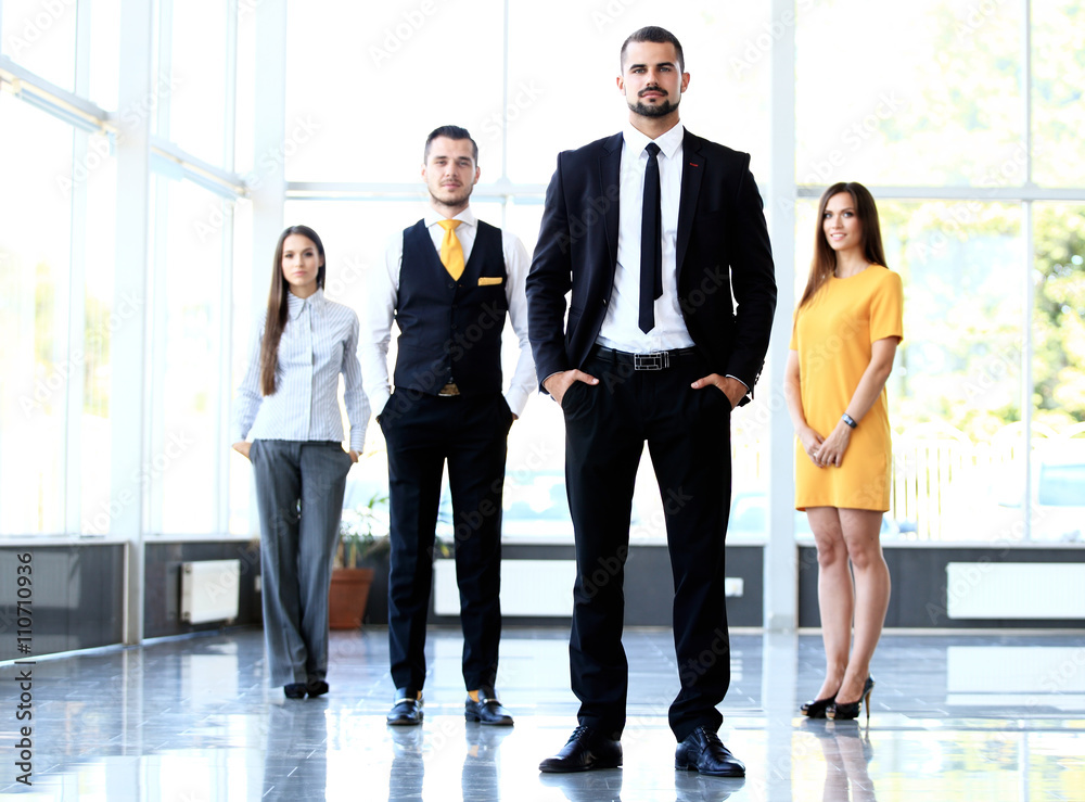 Group portrait of a professional business team looking confidently Group portrait of a professional business team looking confidently