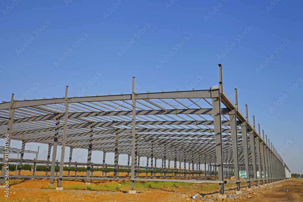In the construction site, steel structure is under construction In the construction site, steel structure is under construction
