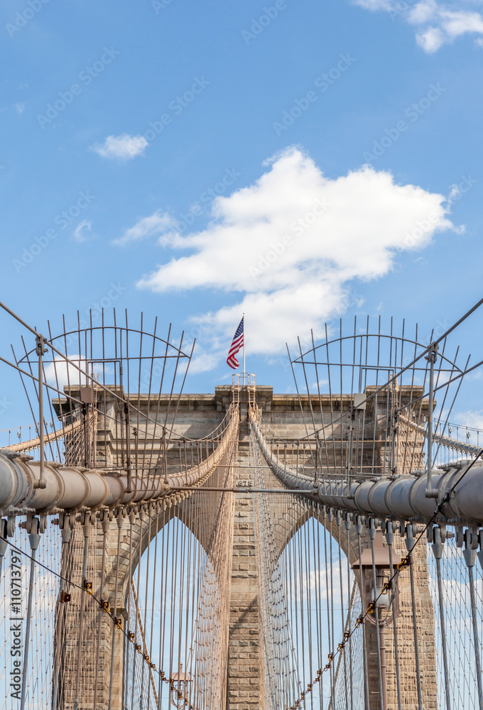 Fototapeta premium The New York’s famous landmark, Brooklyn Bridge with American
