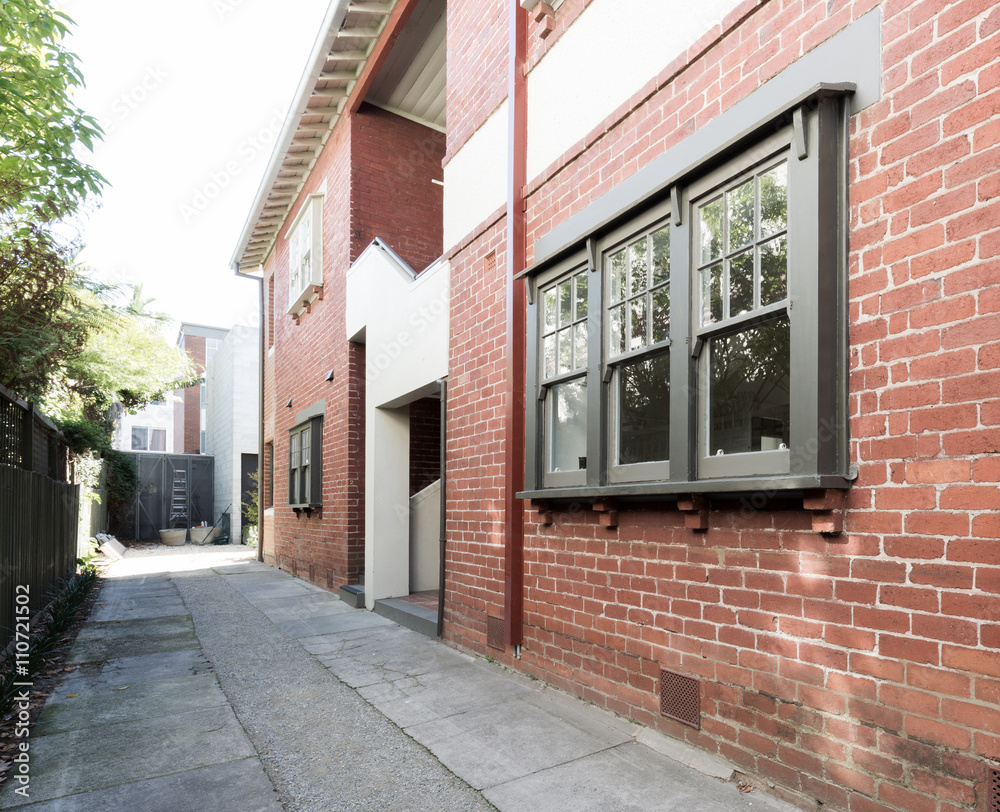 Older style red brick apartment building exterior in Melbourne