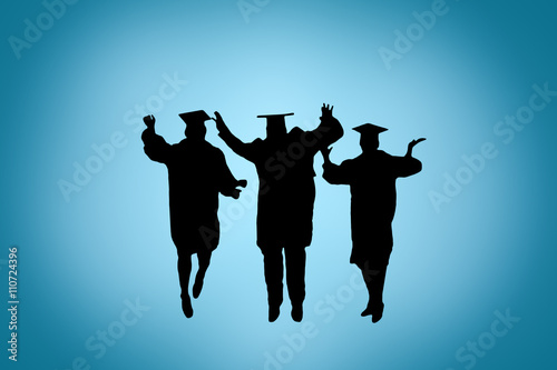 Silhouette of graduates celebrating,  jumping