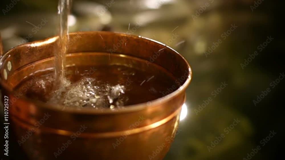 Cuprum can with water