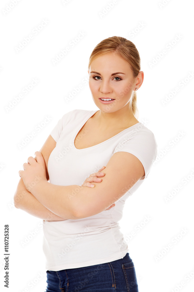 Happy young woman wiyh folded arms Happy young woman wiyh folded arms
