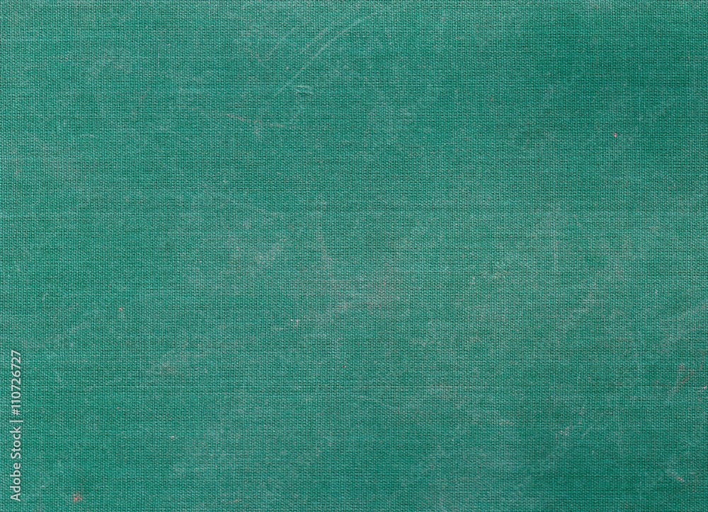 Weathered green canvas texture with scratches Weathered green canvas texture with scratches