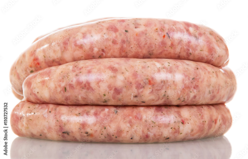 Raw pork sausages isolated on white. Raw pork sausages isolated on white.