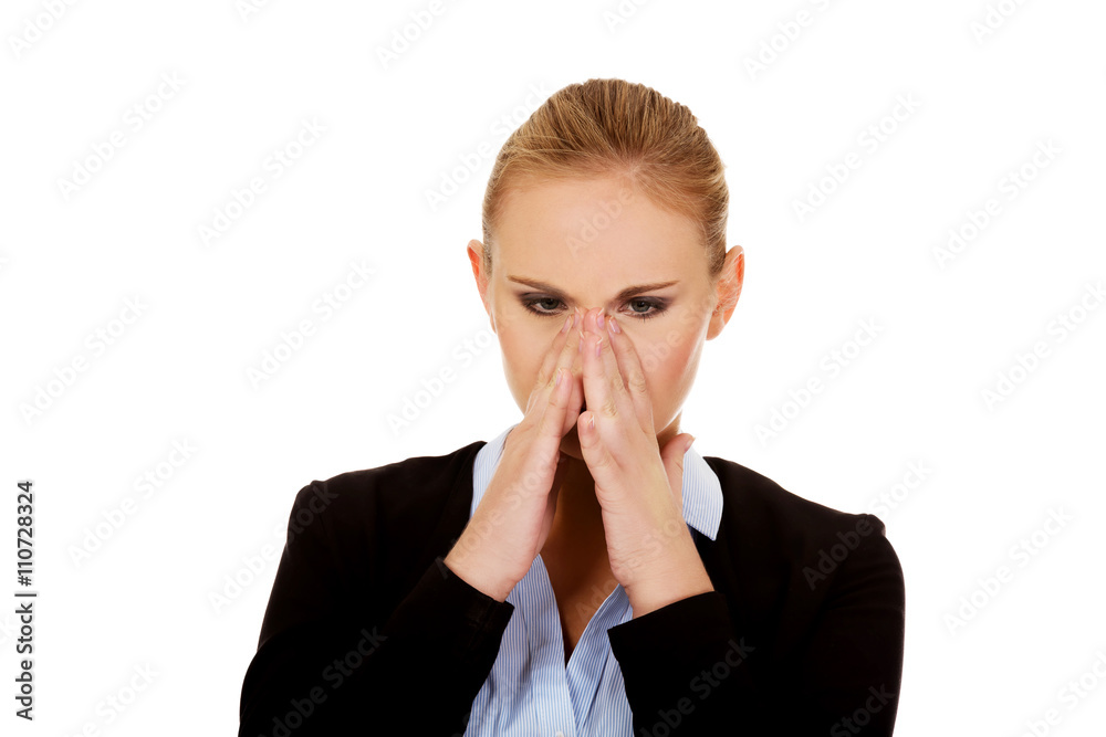Young business woman with sinus pressure pain Young business woman with sinus pressure pain