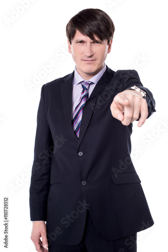 Picture of an angry middle aged businessman in suit