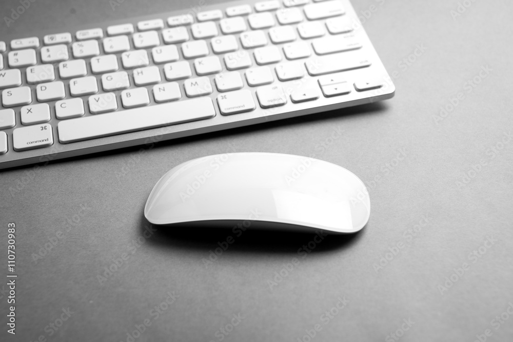 Modern & white computer mouse and keyboard Modern & white computer mouse and keyboard