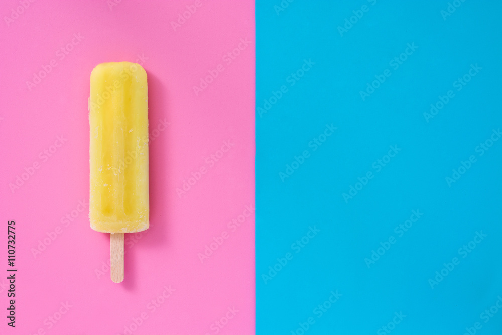 Lemon popsicle on pink and blue background
Lemon popsicle on pink and blue background