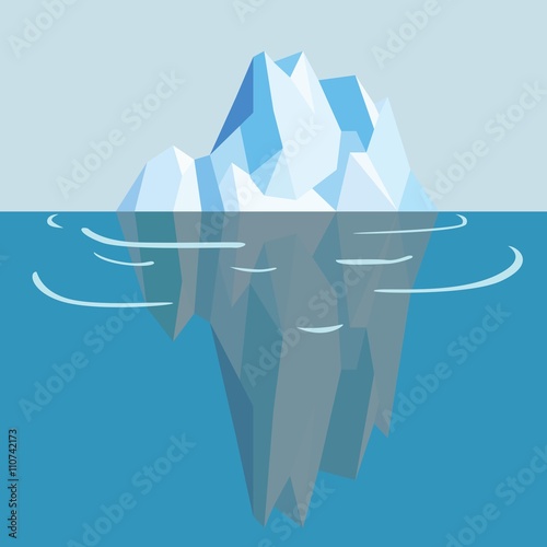 White and blue iceberg in ocean