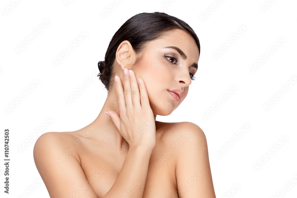 Naklejka premium Young brunette woman with beautiful clean skin