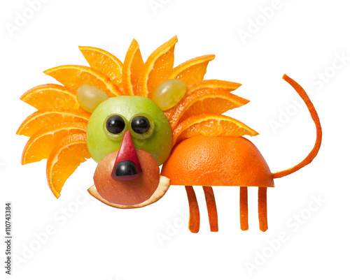 Happy lion made of fruits on isolated background