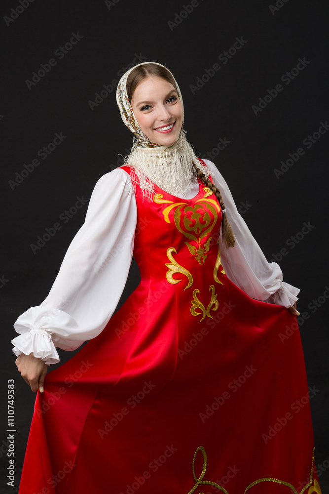 beautiful  smiling caucasian girl in russian folk costume
