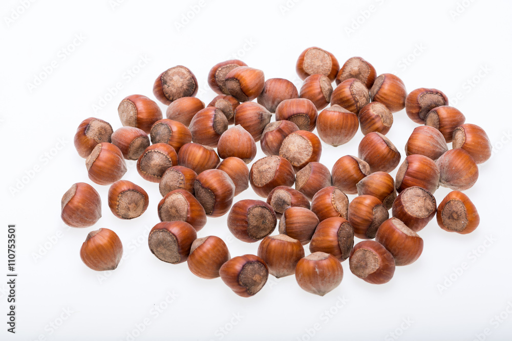 Pile of hazelnuts isolated on white background Pile of hazelnuts isolated on white background