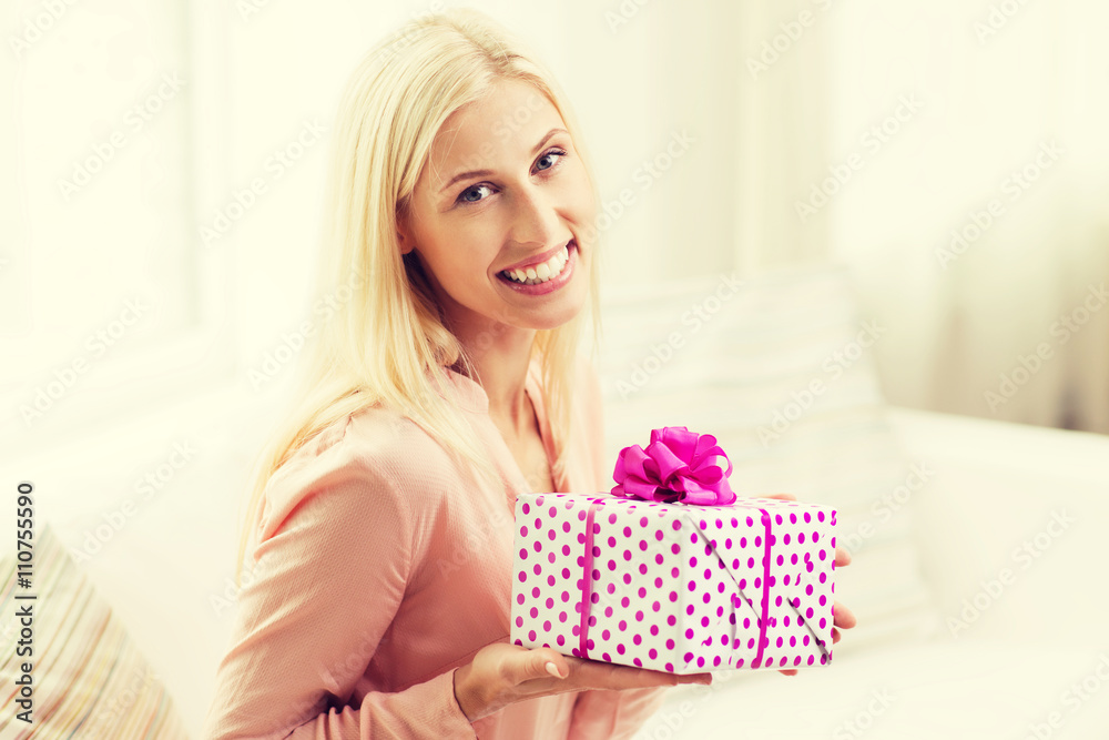 smiling woman with gift box at home smiling woman with gift box at home