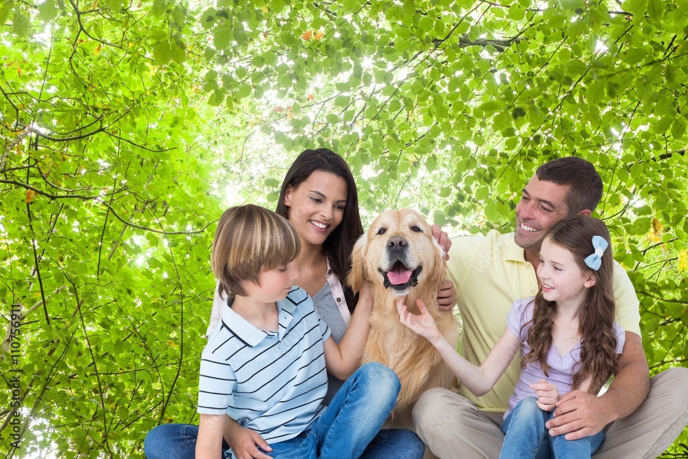 Composite image of happy family with a dog Composite image of happy family with a dog