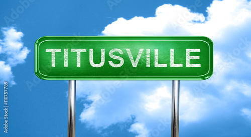 titusville vintage green road sign with highlights photo