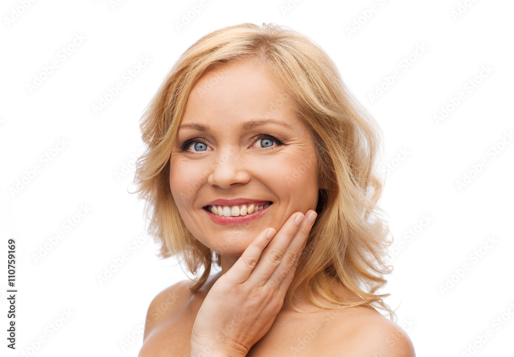 smiling woman with bare shoulders touching face smiling woman with bare shoulders touching face
