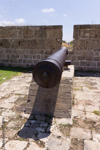 Old cannon on the fortress wall photo