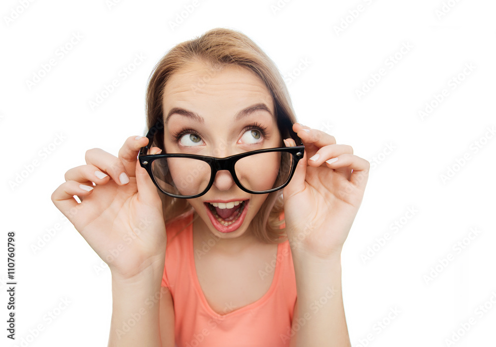 happy young woman or teenage girl in eyeglasses