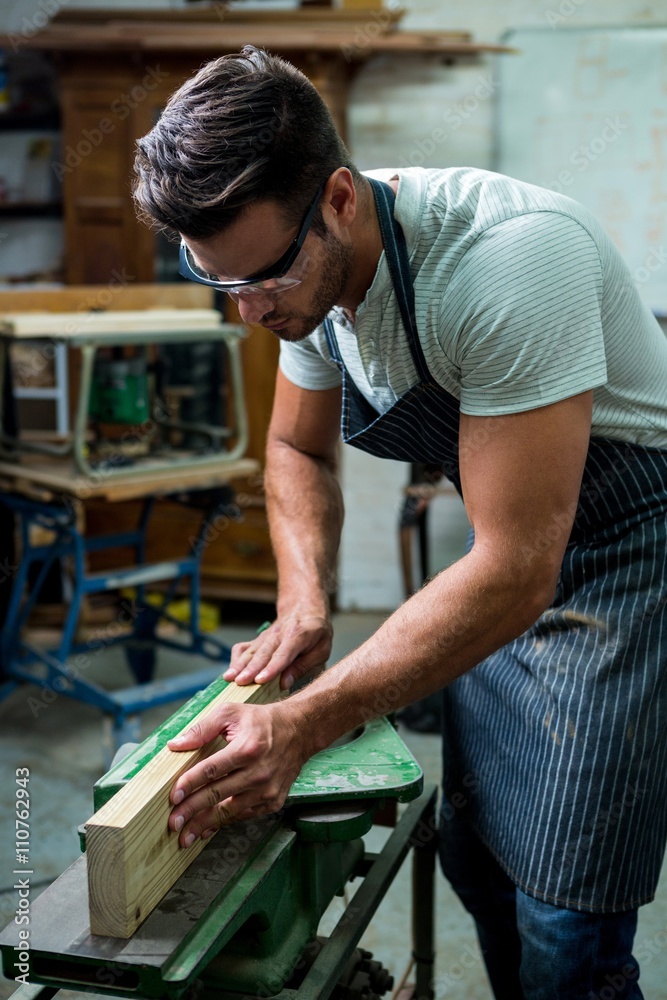 Carpenter working on his craft Carpenter working on his craft
