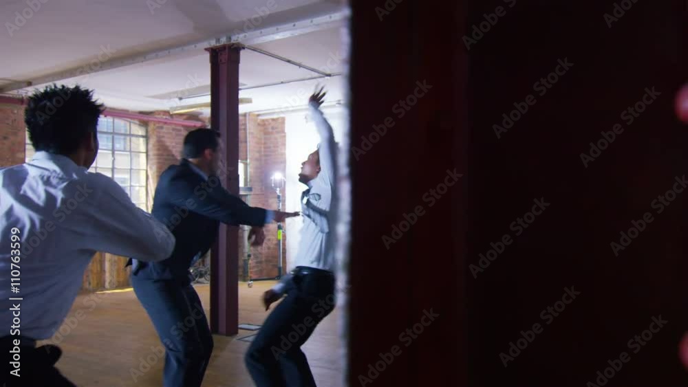  Handsome businessman or special agent character outnumbered in a fight 