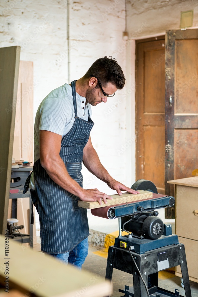 Carpenter working on his craft Carpenter working on his craft