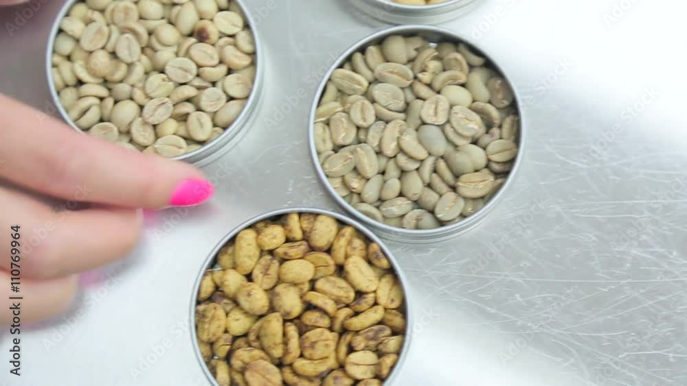 Unroasted coffee beans close up. Unroasted coffee beans close up.