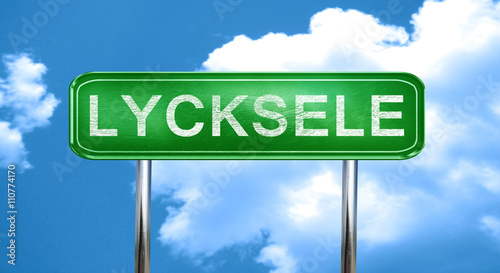 Lycksele vintage green road sign with highlights photo