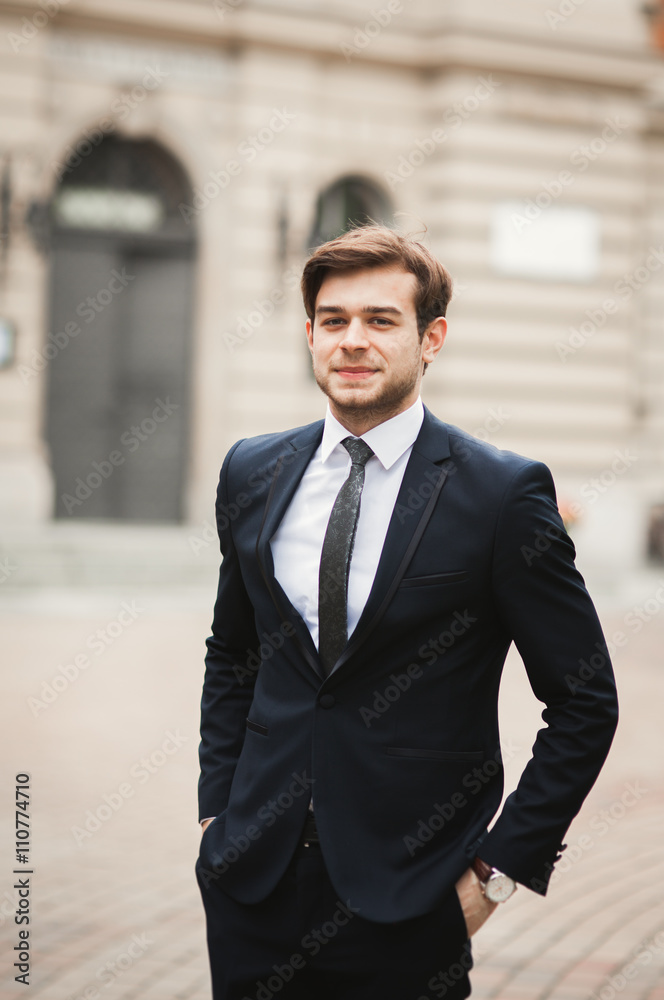 Handsome stylish young businessman posing portrait outdoor Handsome stylish young businessman posing portrait outdoor