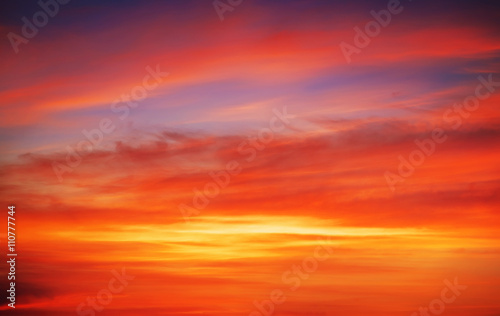 Fiery orange sunset sky. Beautiful sky background. © es0lex