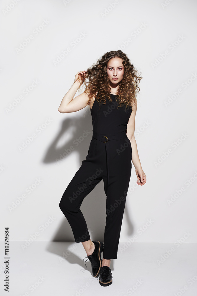 Beautiful model posing in black fashion, portrait Beautiful model posing in black fashion, portrait