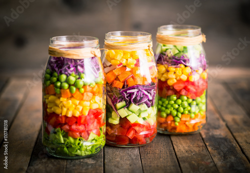 Obraz na plátně Fresh vegetable salad in a mason jar