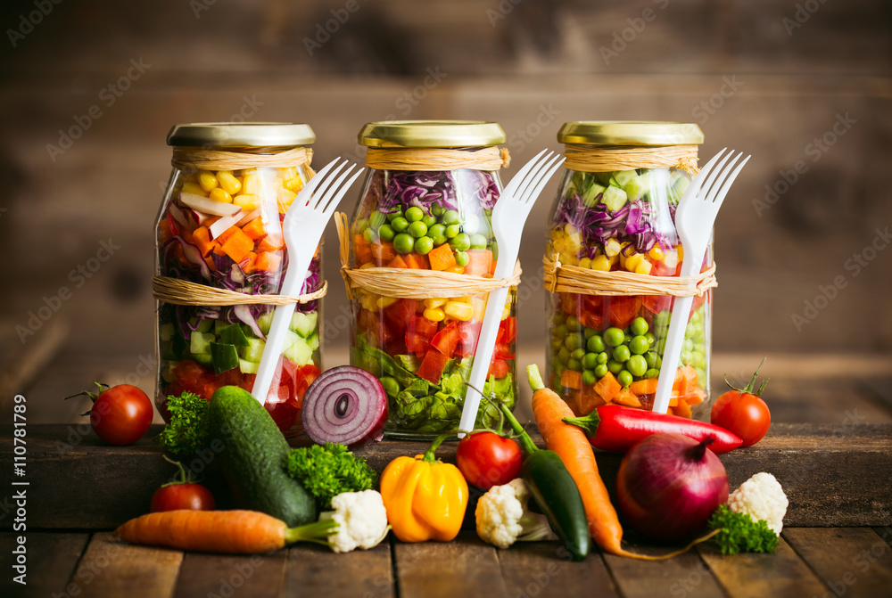 Fresh vegetable salad in a mason jar Fresh vegetable salad in a mason jar