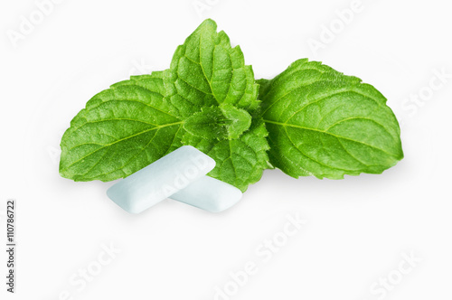Chewing gum with fresh mint leaves photo