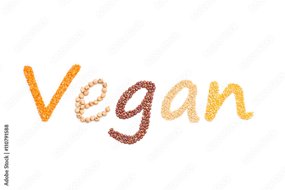 Wort Vegan als Schriftzug aus verschiedenen Hülsenfrüchten als Freisteller Wort Vegan als Schriftzug aus verschiedenen Hülsenfrüchten als Freisteller