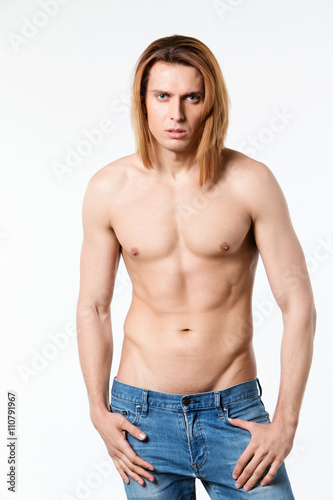 Man with sexy abs and jeans.