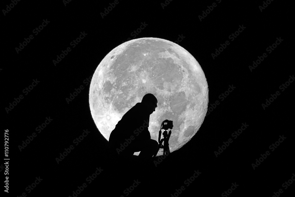 Photographer and moon