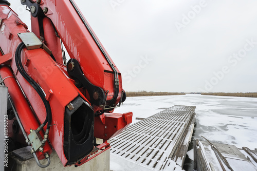 Slipper Kran im Winterhafen am See photo