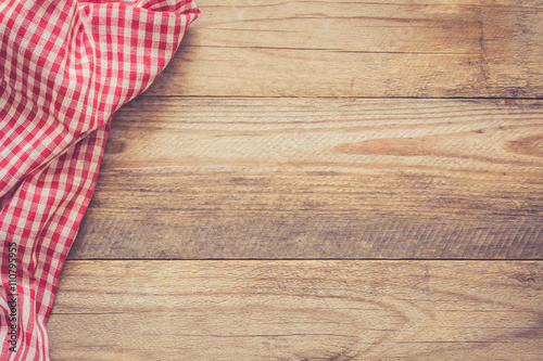 Wooden background with textile / Cooking food / pizza wooden table background with red and white textile. Copy space for text