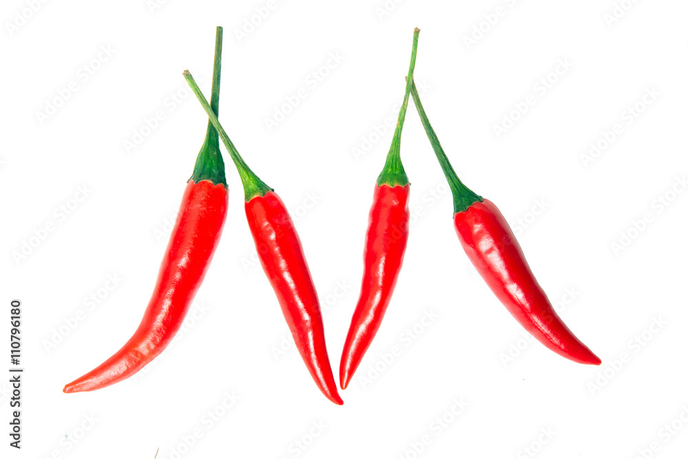 M Letter from red hot pepper on the white