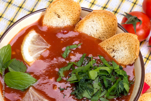 Tomato soup in a bowl photo