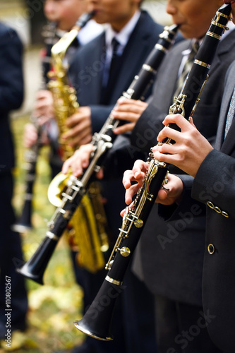 group of musicians playing the clarinet.